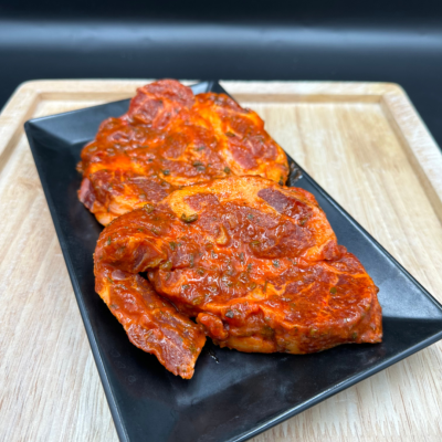Côte de porc mariné à 12.95€ /kg