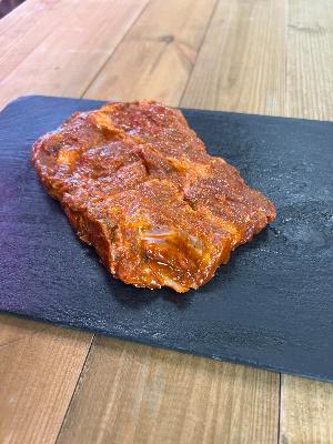 Côte de porc mariné à 12.95€ /kg